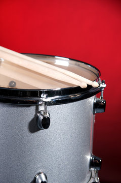 Silver Tom Drum Isolated On Red