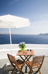 view from house patio of volcanic islands of santorini greece