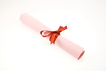 Diploma with red ribbon