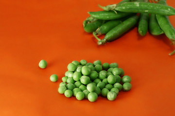 set of Green peas vegetable on orange background