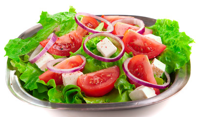 Greek salad with tomatoes cheese, herbs and onions