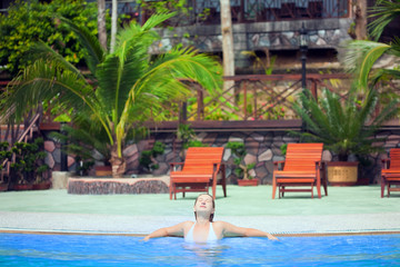 Woman in swimming pool