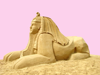 Statue sphinx from sand