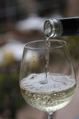 Pouring white wine