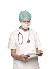Nurse with stethoscope and a journal towards white background