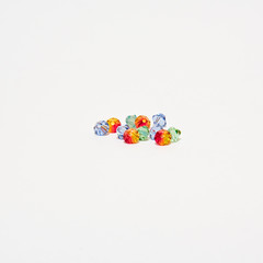 Set of coloured strasses isolated over white background