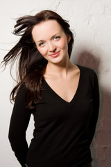 Fototapeta premium Portrait of the young brunette woman