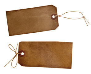two different grunge paper tags isolated on white
