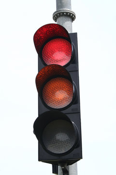 View of a traffic lights - red and orange lit