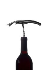 Silhuette of a bottle opener and a red wine bottle