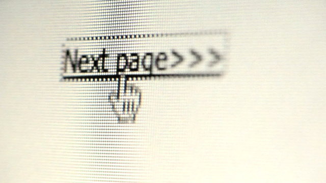 Cursor clicking on next page on computer monitor