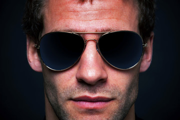 Man wearing aviator sunglasses
