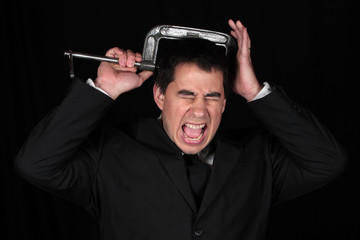 Businessman feeling the pressure