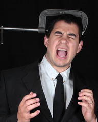 Businessman feeling the pressure