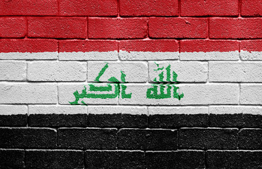 Obraz premium Flag of Iraq on brick wall