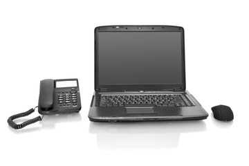 workplace. laptop with telephone