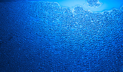 Wet glass with water drops