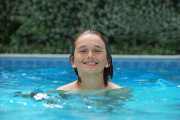 Smiling Teen in Swimming Pool