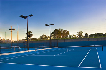 Tennis courts at sunset
