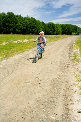Obraz premium Boy with bike