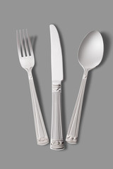 gold fork, knife and spoon