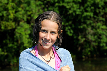 girl smiling after a swim