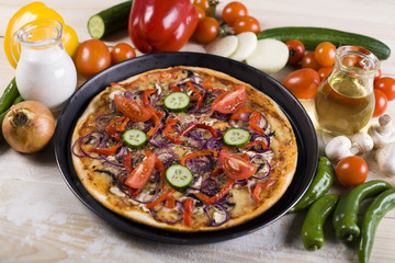 Supreme pizza in pan
