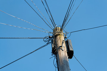 An UK telegraph pole with complex wiring