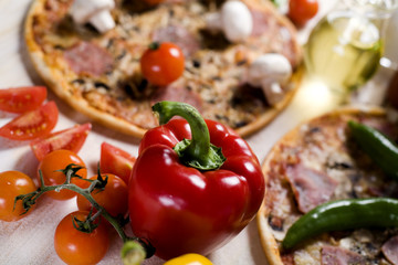 Fresh vegetables with a pizza