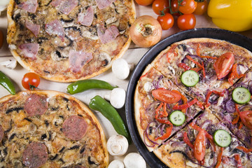 Fresh vegetables with a pizza