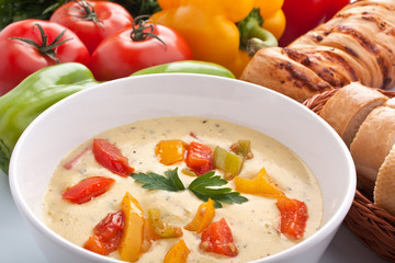 serving of cheese and vegetable cream soup