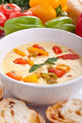 serving of cheese and vegetable cream soup