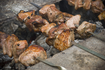 Shish kebab roasting on an open fire