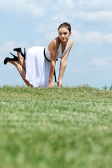 Fashion beautiful woman in white dress