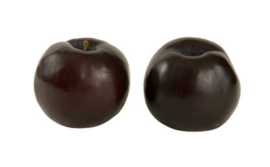 PAIR OF FRESH RIPE PLUMS