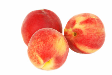 Fototapeta na wymiar Three fresh peach isolated on white background