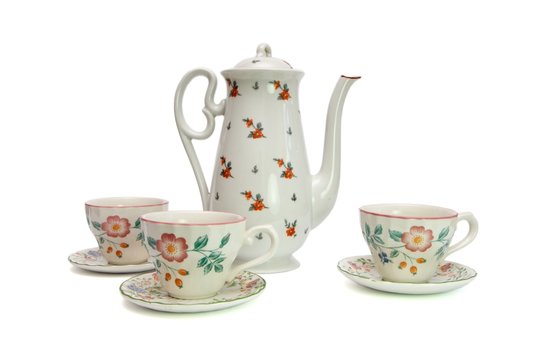 White tea service  painted with dogroses isolated