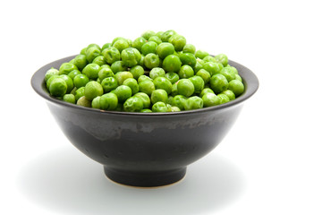 Bowl with peas isolated on white background