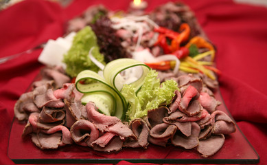 Catering fresh and teasty food at a party on big table..