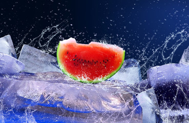 Water drops around watermelon on the ice