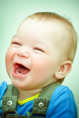 baby laughs