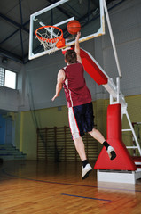 Fototapeta na wymiar basket ball game player at sport hall