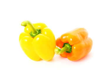 Orange peppers on white background