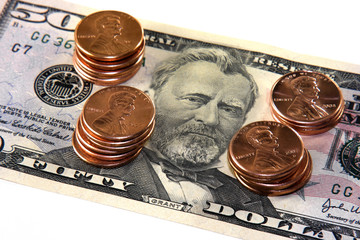 Fifty Dollar Bill and Stack of Pennies