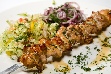 barbecue with sauce and vegetables
