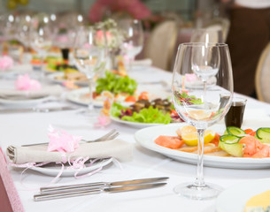 Modern tableware and glasses on a table