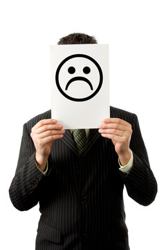 Businessman with sad smilie