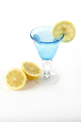 Stock photo of a glass with lemon garnish