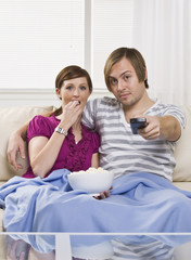 Obraz na płótnie Canvas Couple on couch