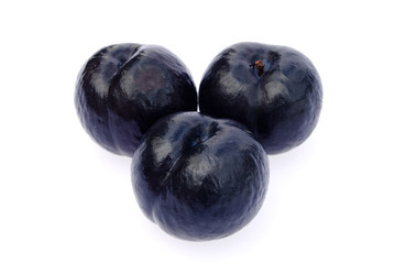 three black plums